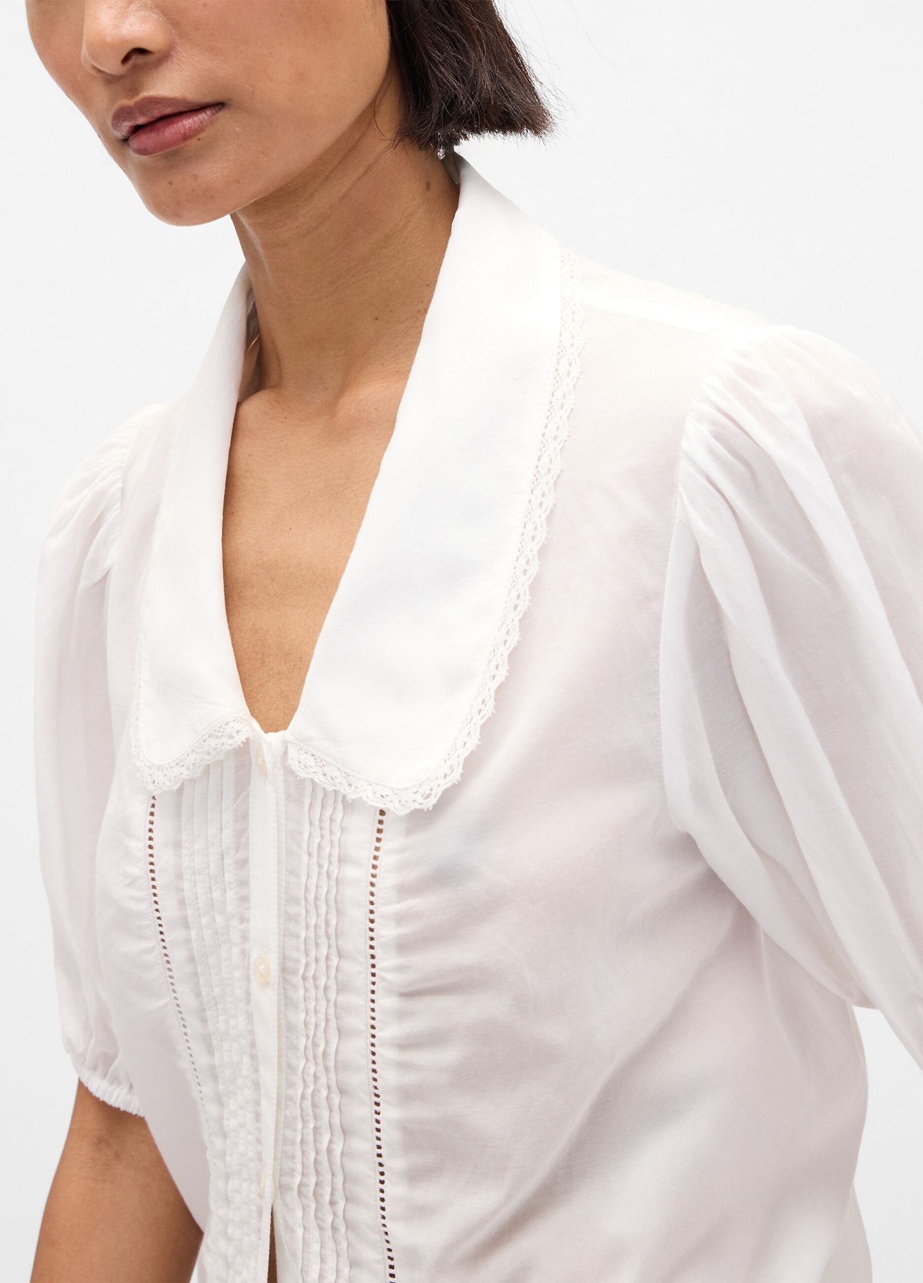 White blouse with short puff sleeves