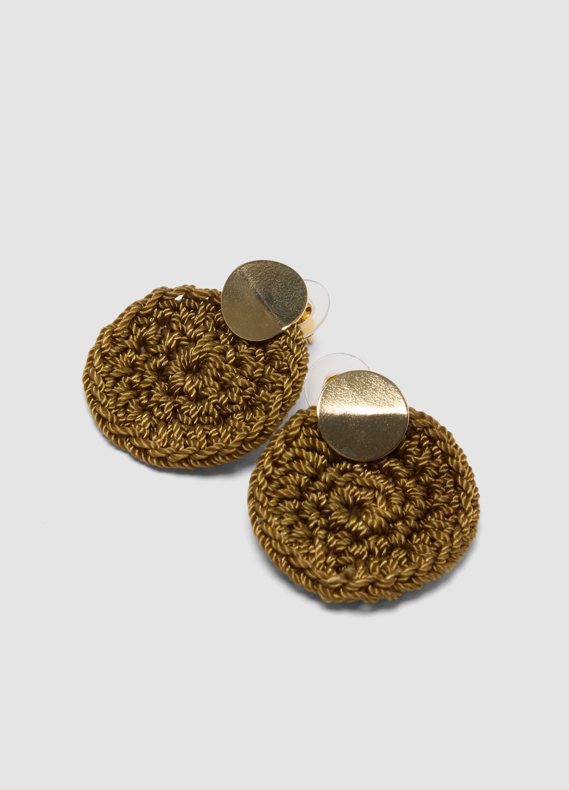 Round braided brown earrings with gold-tone detail