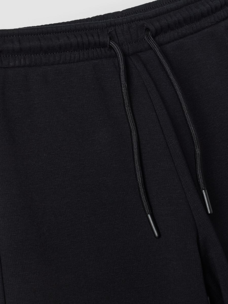 Black wide-leg trousers in stretch fleece fabric_2