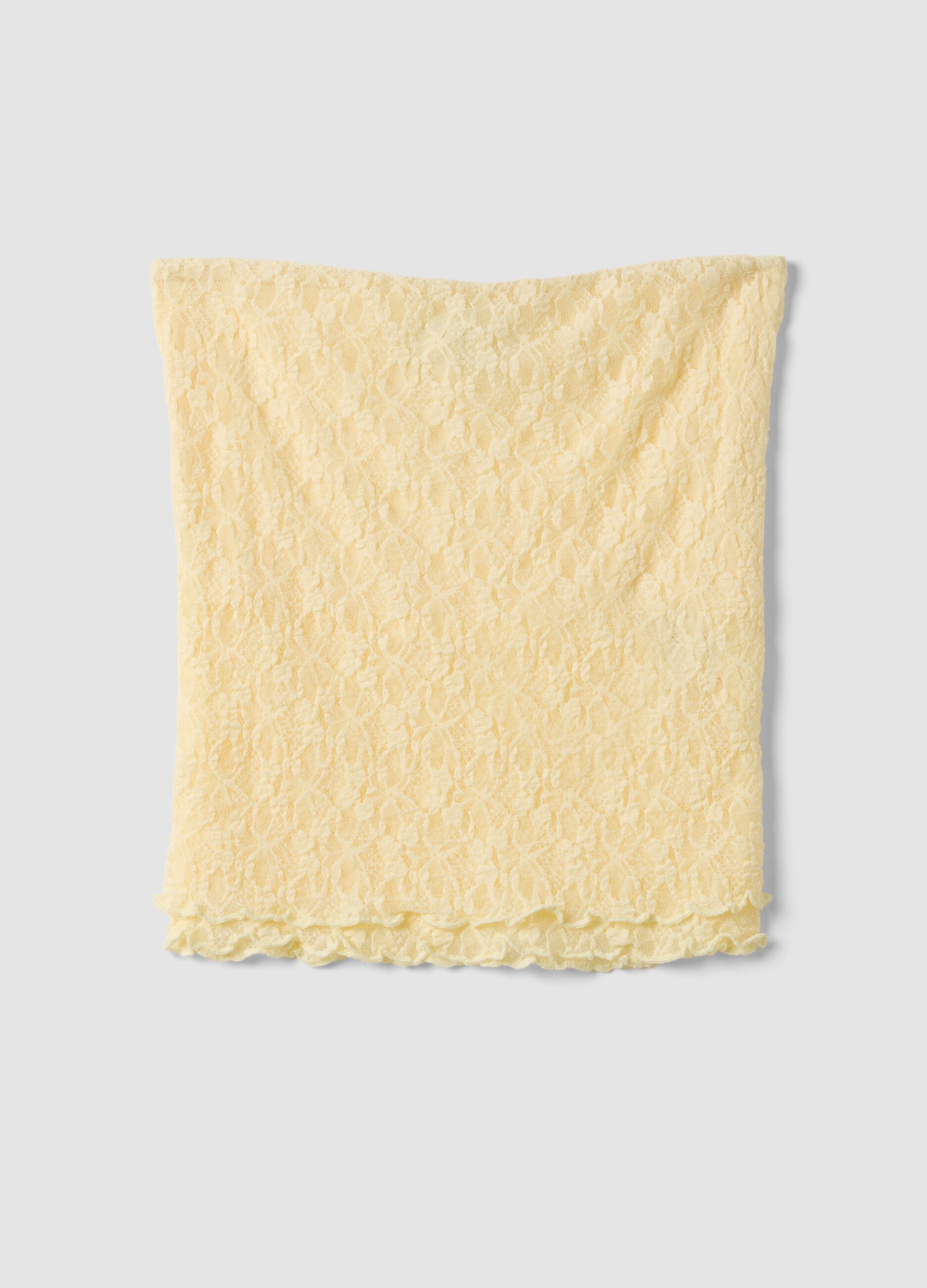 بلوزة صفراء قصيرة من قماش مطاطي مزينة بنقوش زهرية