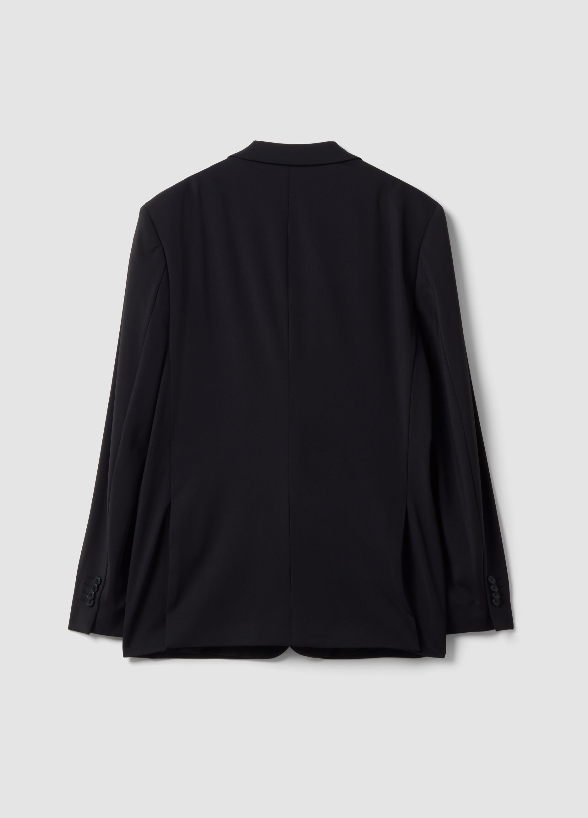 بليزر أسود بقصّة Slim Fit من قماش مطاطي 4-Way Stretch سهل الكي