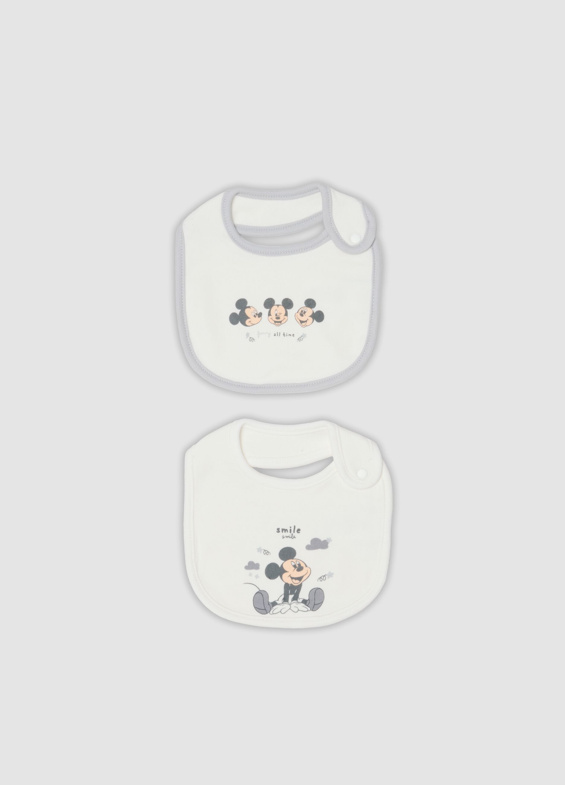2-pack of white organic cotton bibs with Mickey print