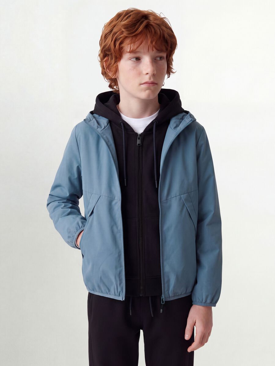 Blue oversized rain jacket with hood and zip for boys_0